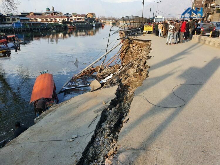 Two-wheeler, Shikaras damaged after road portion caves in at Dalgate
