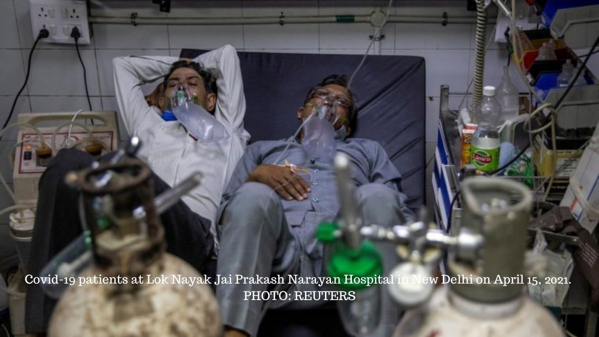 Two to a bed in Delhi hospital as India's Covid-19 crisis spirals Two to a bed in Delhi hospital as India’s Covid-19 crisis spirals