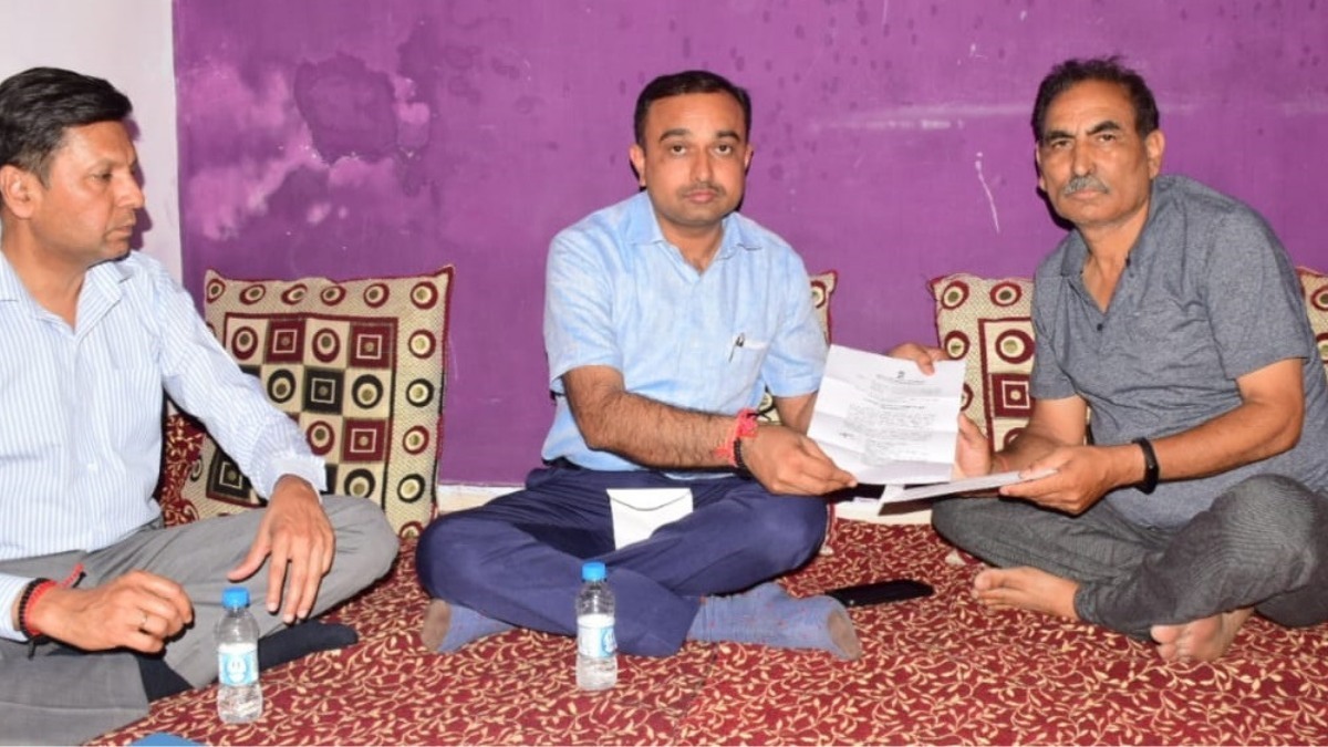 Div Com Jammu hands over Appointment letter, Ex gratia amount to Rahul Bhat’s family