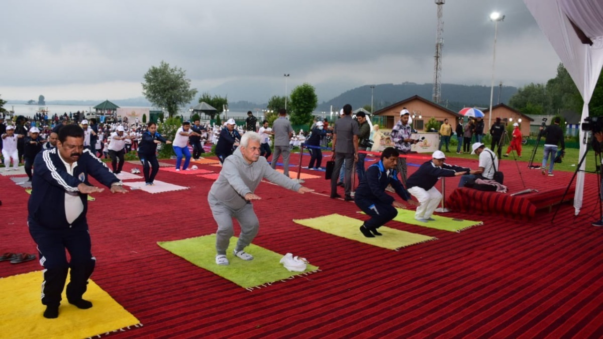 International Yoga Day: LG Manoj Sinha leads hundreds at mass yoga programme at SKICC, Srinagar