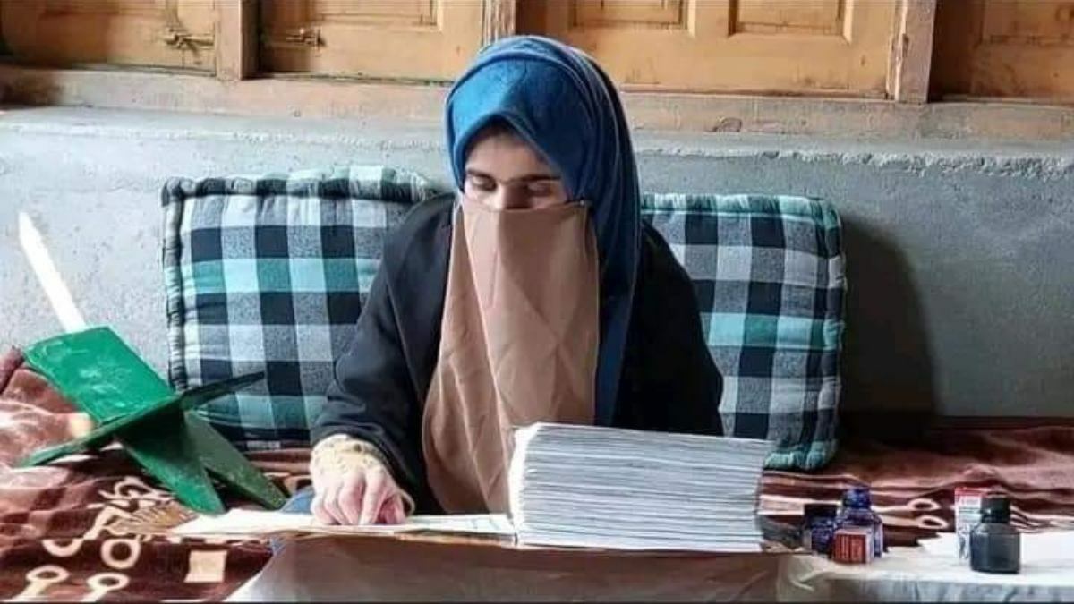 Ganderbal girl writes Qur’an after memorizing it