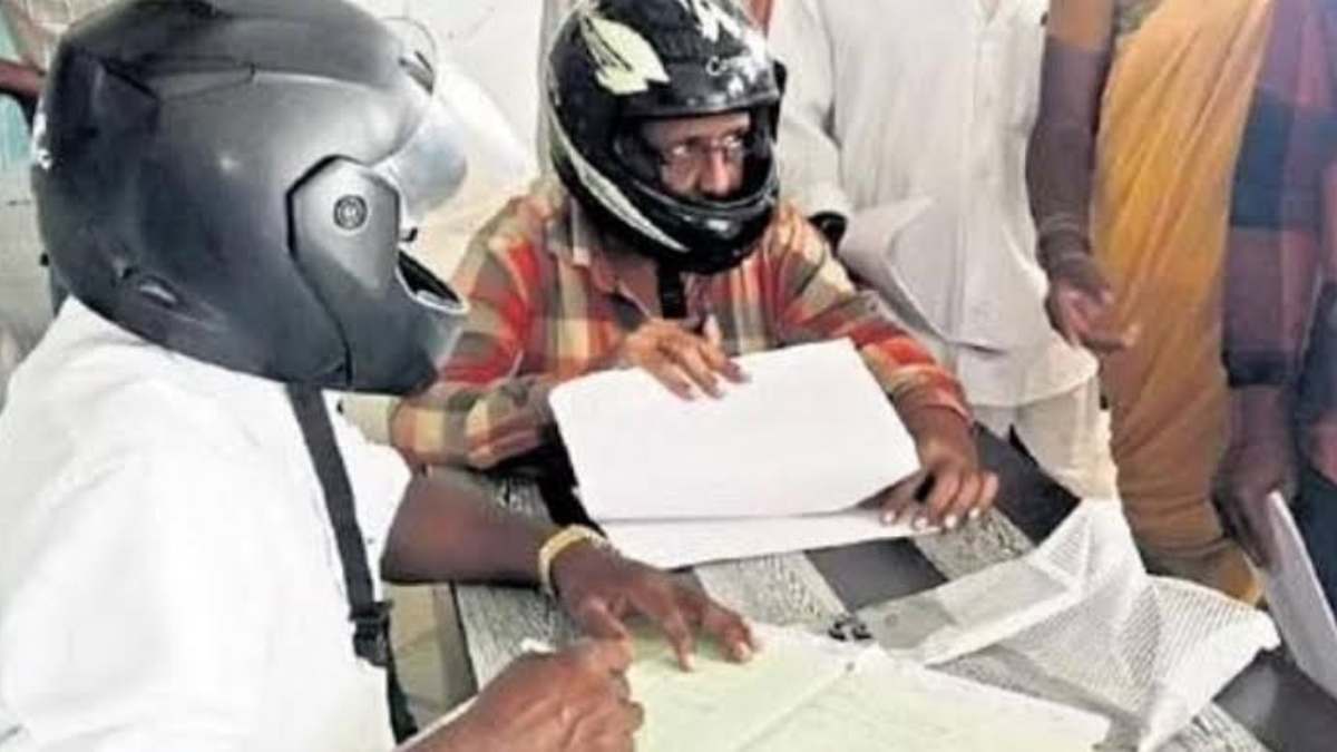 Govt officials wear helmets inside office over fear of roof collapse Govt officials wear helmets inside office over fear of roof collapse