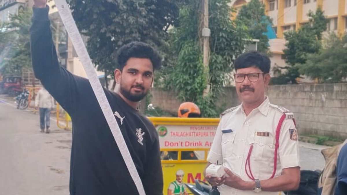 Bengaluru police catches a biker with 40 traffic cases, makes him clear dues on spot