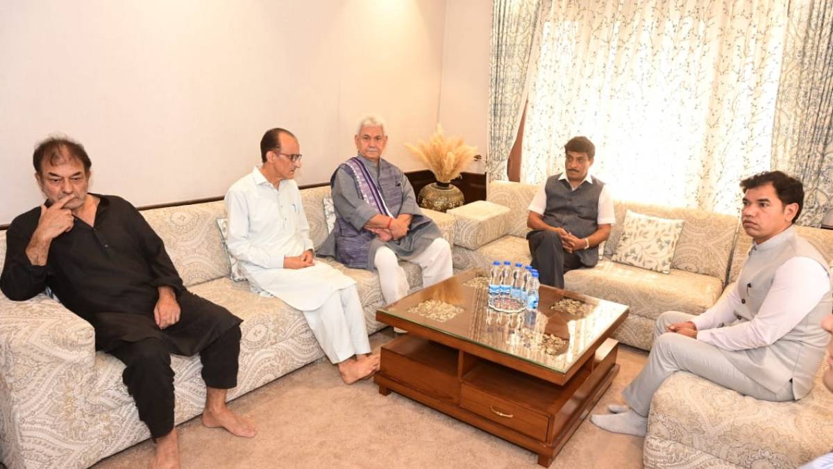 LG visits family members of Shaheed DySP Humayun Bhat in Humhama, Budgam