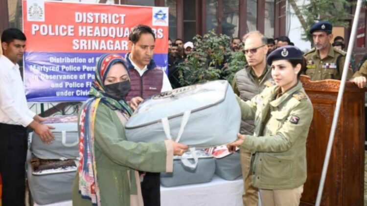 Police distributes blankets among the families of police martyrs in Srinagar