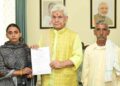 LG Manoj Sinha Hands Over Appointment Letter to Sister of Bus Conductor Martyred in Reasi Terror Attack LG Manoj Sinha Hands Over Appointment Letter to Sister of Bus Conductor Martyred in Reasi Terror Attack